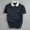 Áo polo monogram in tràn họa tiết